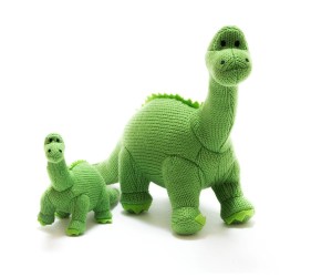 Small green, orange and stripe knitted stegosaurus dinosaur baby rattles